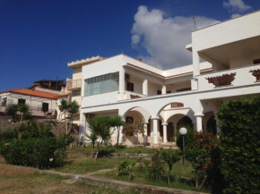Отель B&B Villa Dora  Капо Дорландо